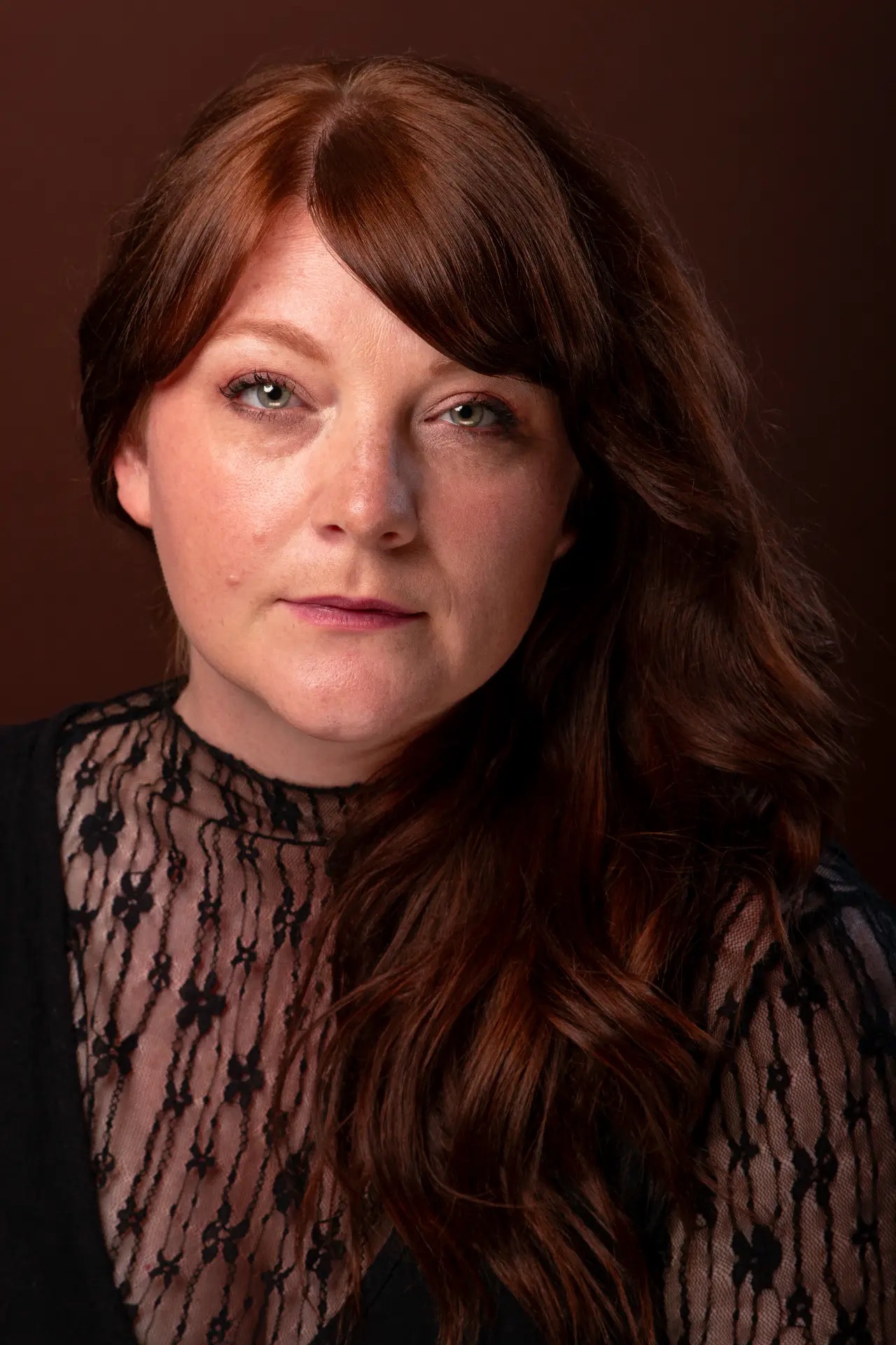 Studio portrait, warm backdrop